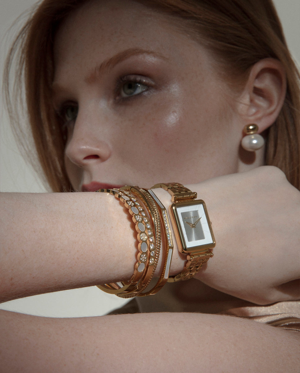 PULSERA DE MUJER DE ACERO IP DORADA RÍGIDA