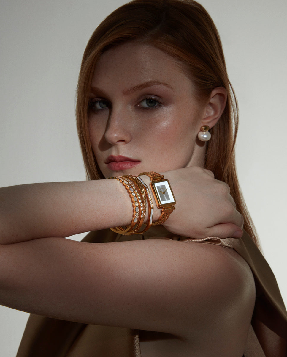 PULSERA DE MUJER DE ACERO IP DORADA RÍGIDA