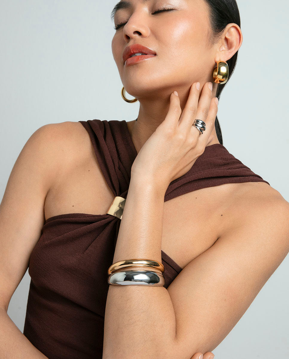 PULSERA DE MUJER DE ACERO DE IP DORADO RÍGIDA VOLUMEN