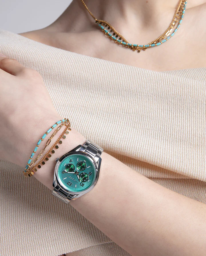 PULSERA EN ACERO DORADO MÚLTIPLE CADENA Y PIEDRAS AZULES. Ref. 14164P01013