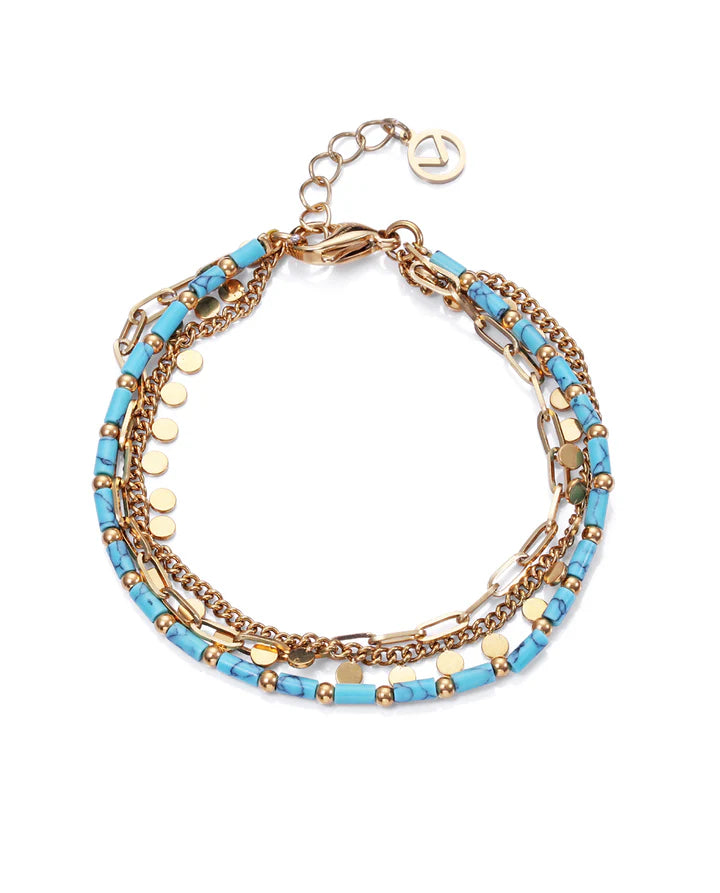 PULSERA EN ACERO DORADO MÚLTIPLE CADENA Y PIEDRAS AZULES. Ref. 14164P01013
